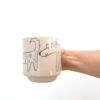 Taza ilustrada hecha en gres